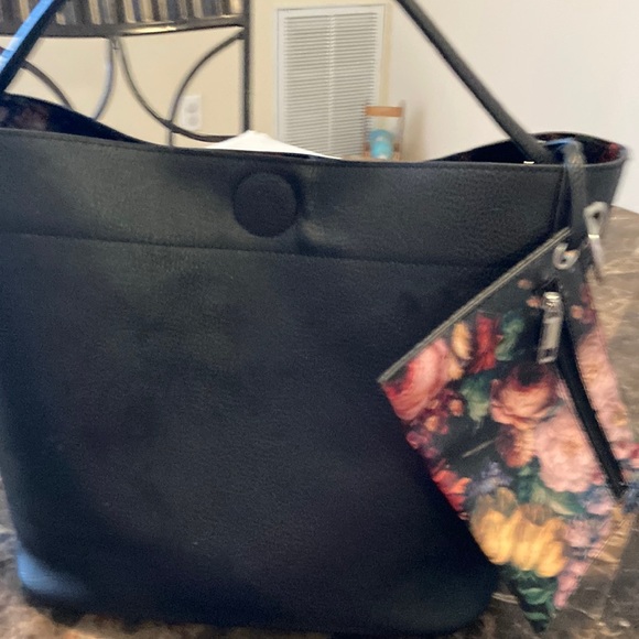 Carlos Santana Handbags - Carlos Santana bucket bag. Faux leather floral wallet and inside of bag